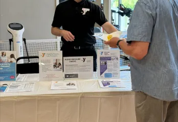 a man learns about programming for seniors at the Y