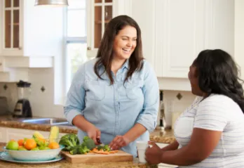 Two women prepare a healthy lunch