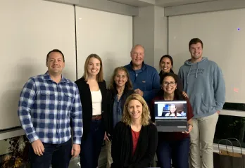 image of a group of people smiling for the camera