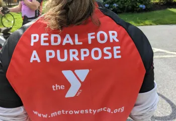 photo of the back of a shirt that says Pedal for a Purpose