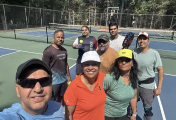 Pickleball players on our beautiful new outdoor courts