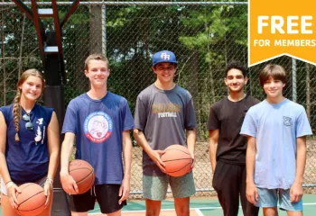 teens on outdoor basketball court