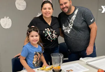 Family cooking together at Cooking with Littles class at MetroWest YMCA Framingham Branch