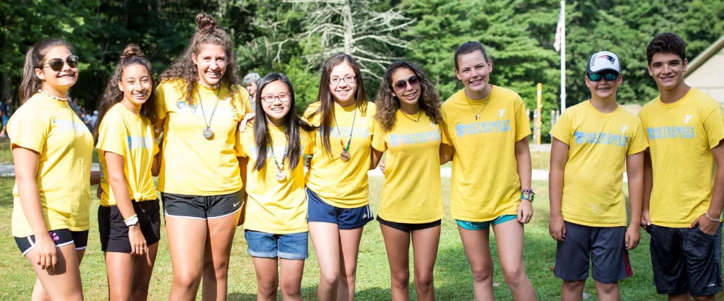 A group of Counselors smile at Hopkinton Summer day camp