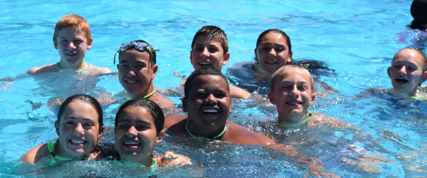 group of teens in the pool