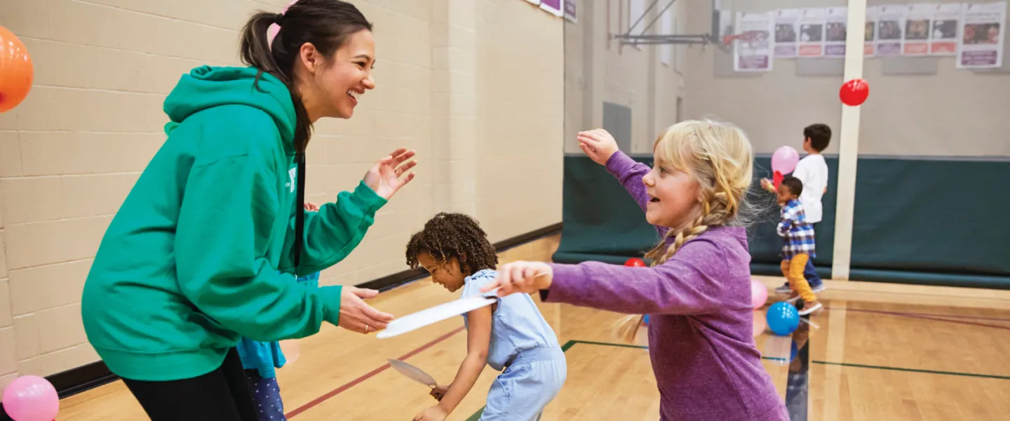 staff member and young girl