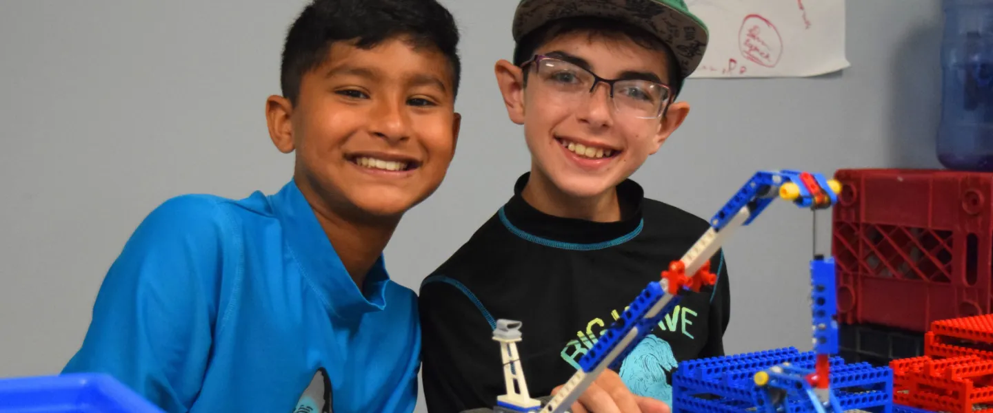 image of two boys playing with legos