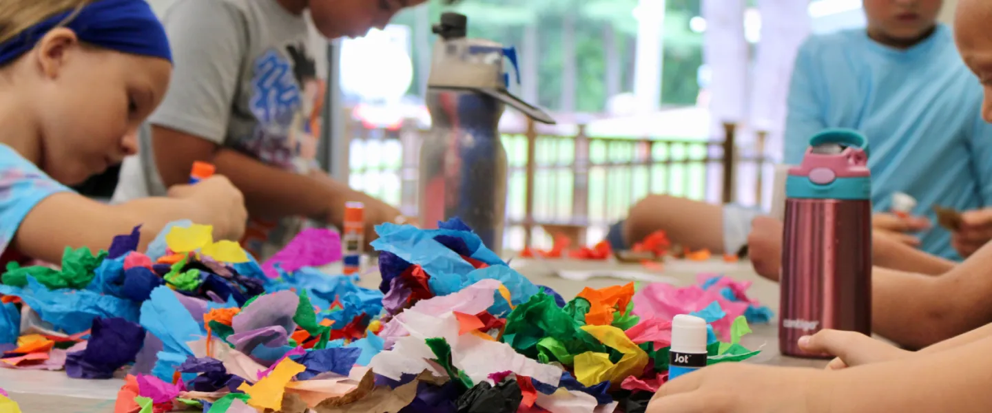 close up image of kids doing arts & crafts