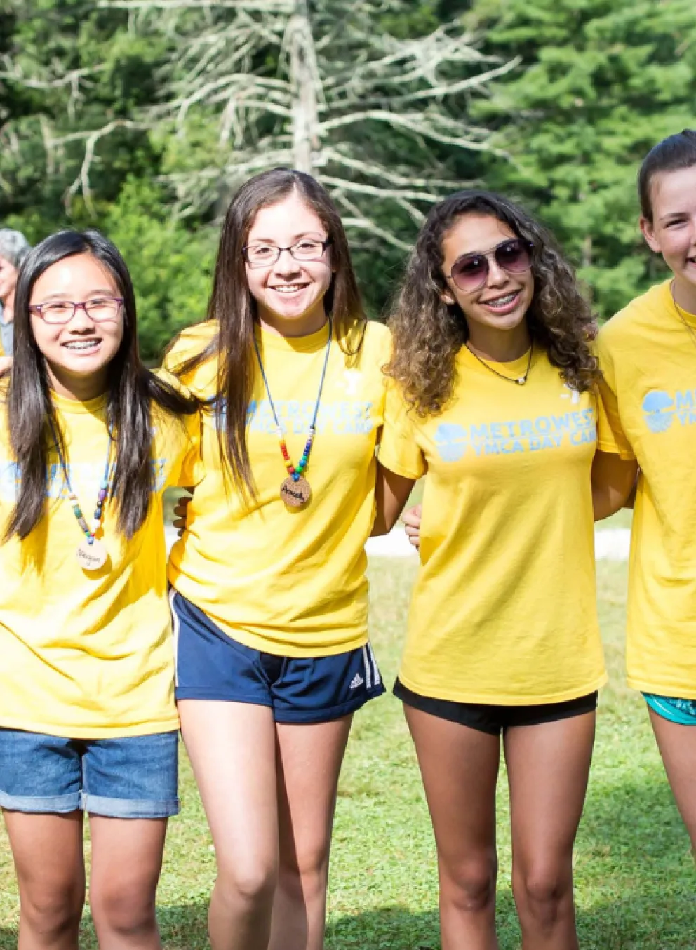 A group of Counselors smile at Hopkinton Summer day camp