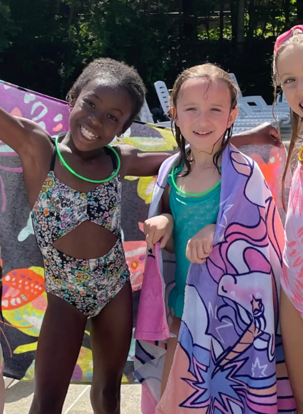 Bathing beauties! Four girls strike a pose post-swim