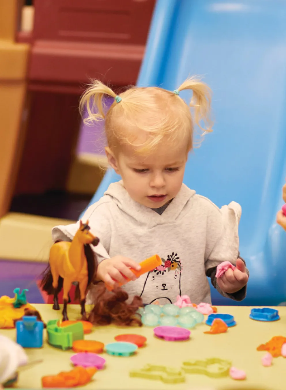 group of toddlers playing and learning