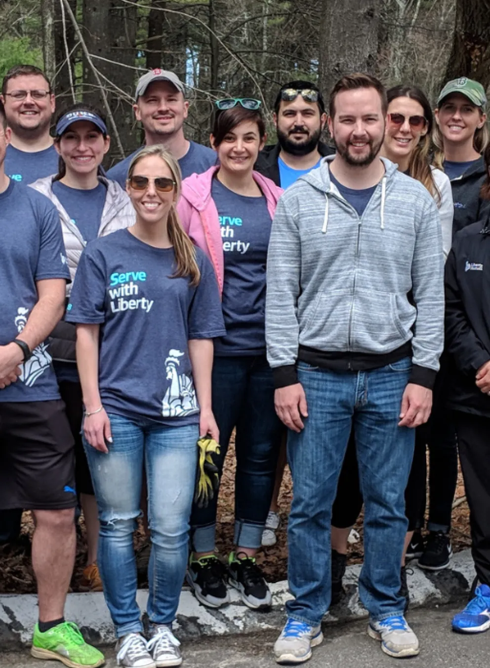 group of volunteers smiling together