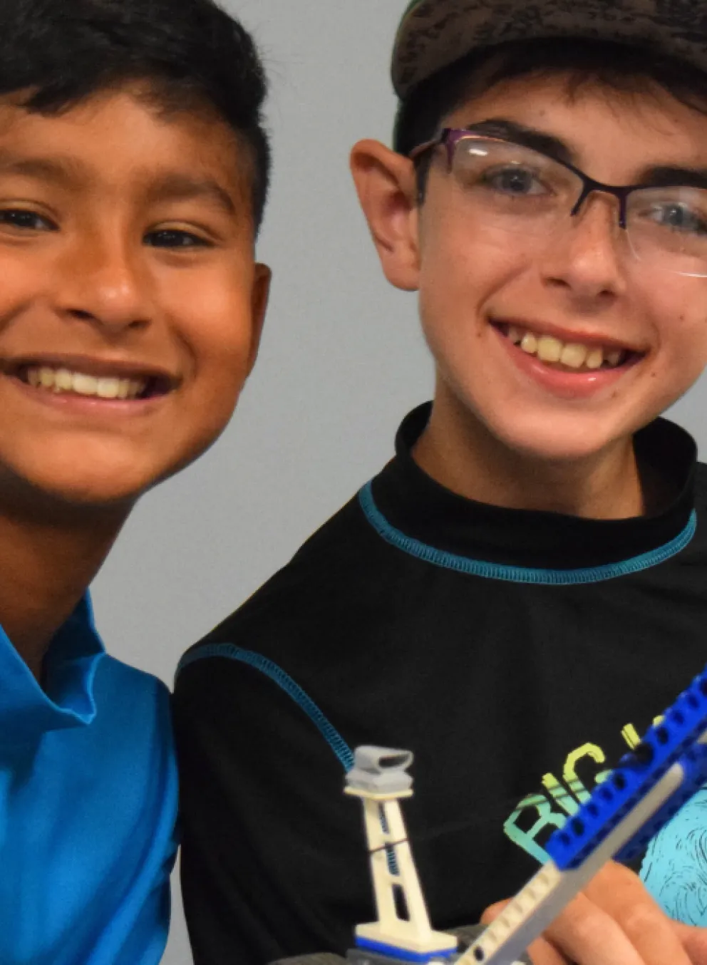 image of two boys playing with legos