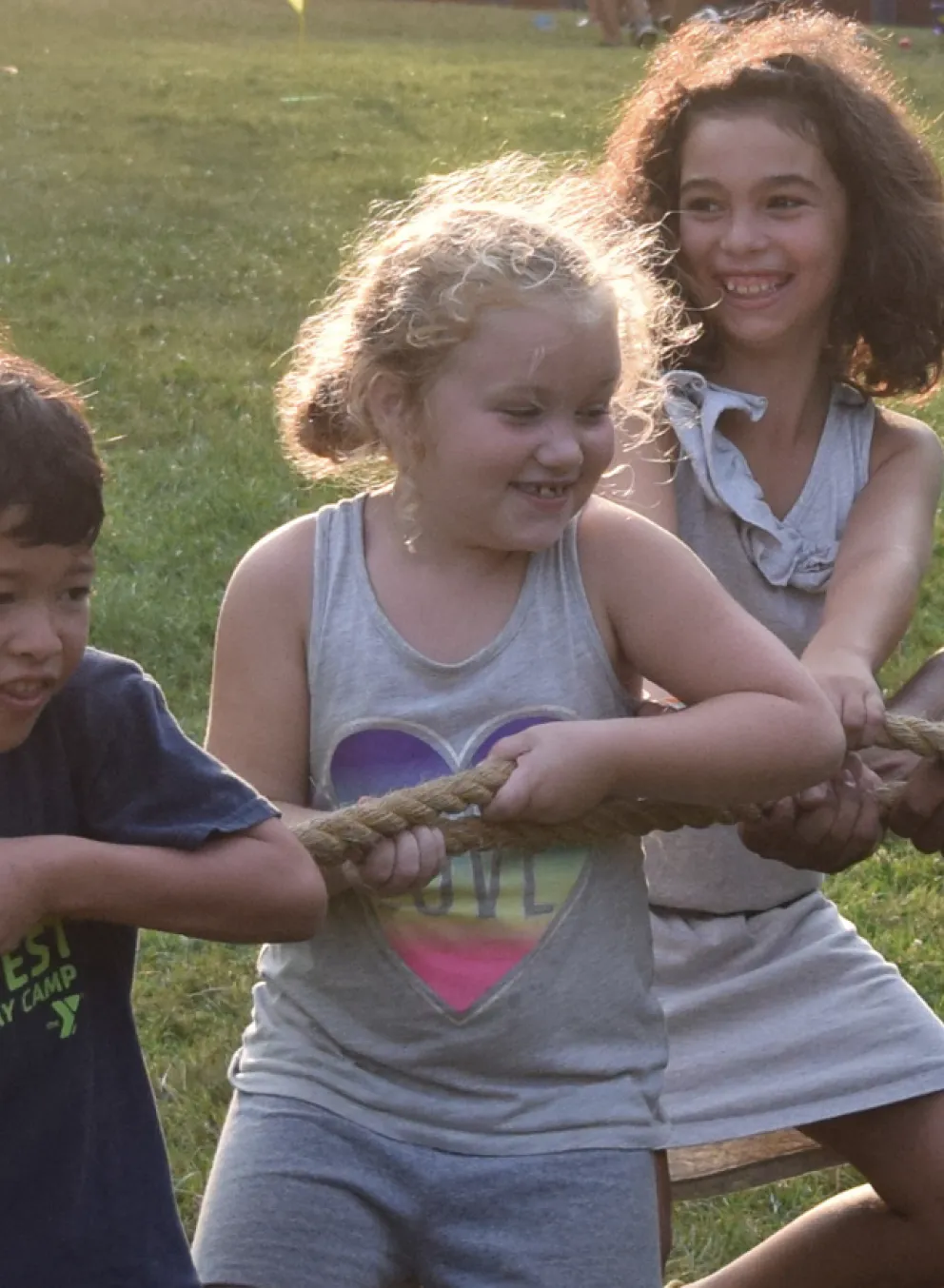 image of campers playing tug-of-war