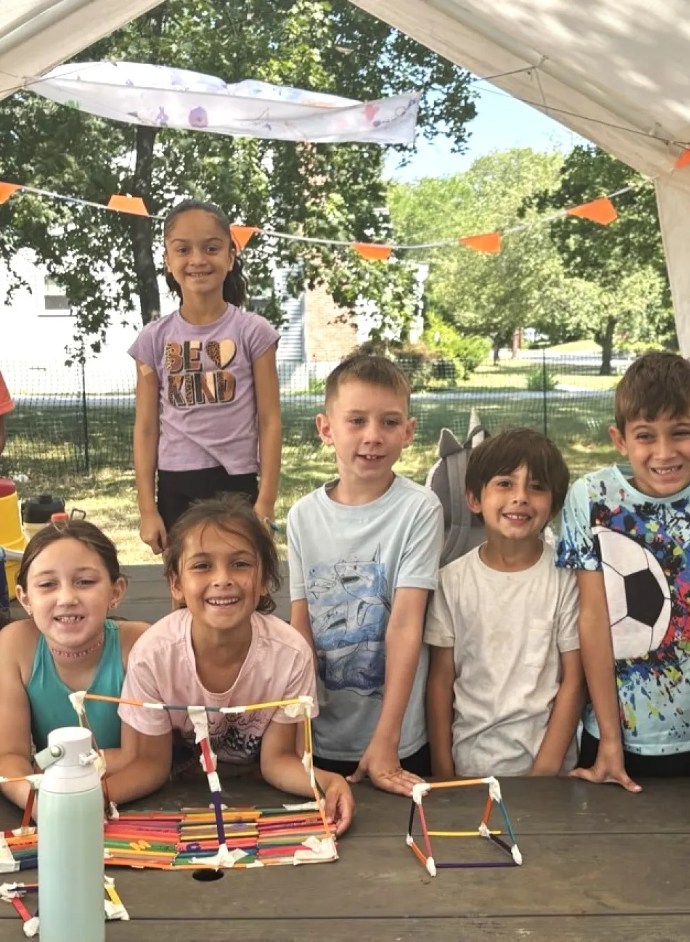 group of campers smiling at the camera