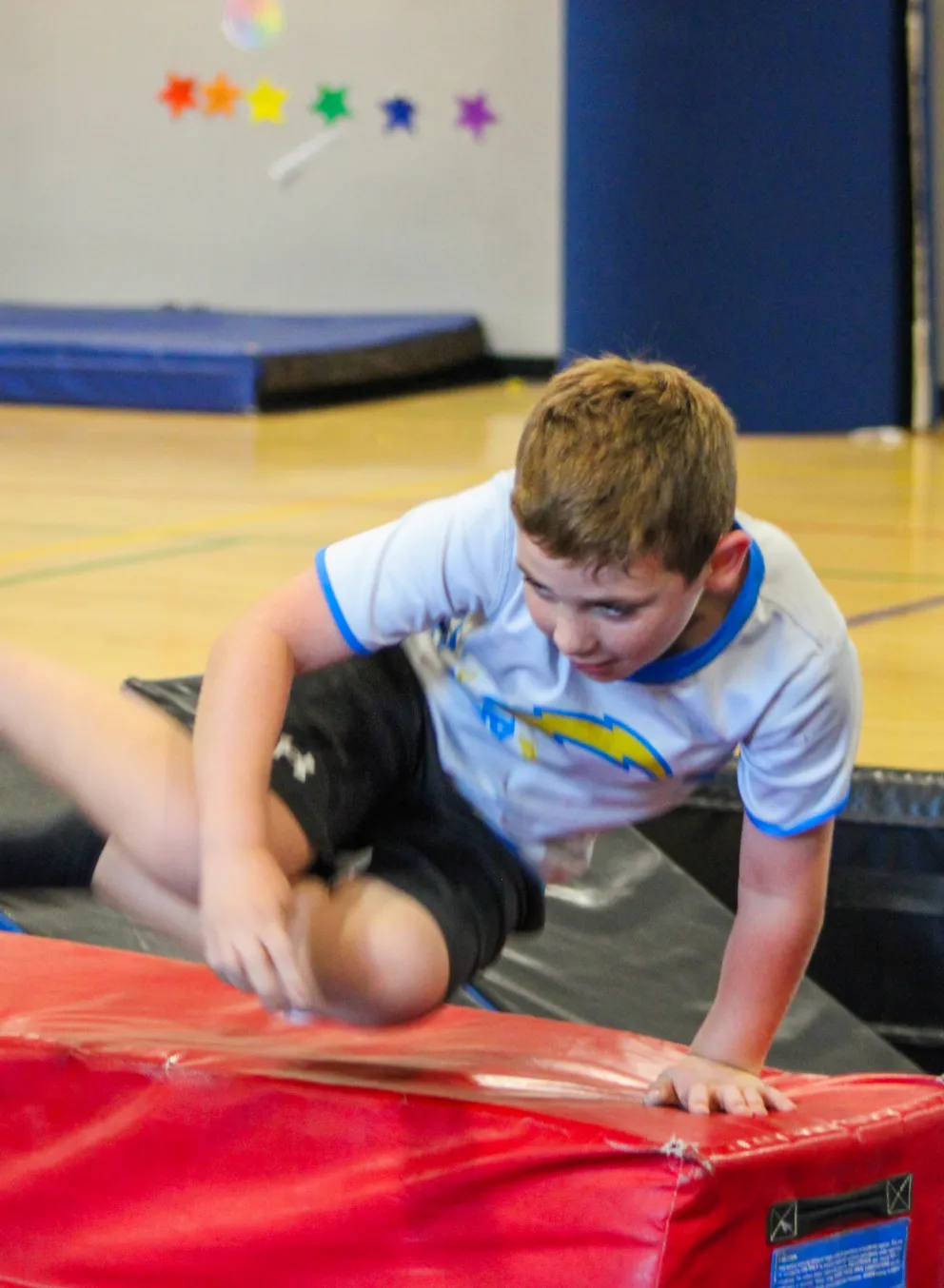 boy on obstacle course