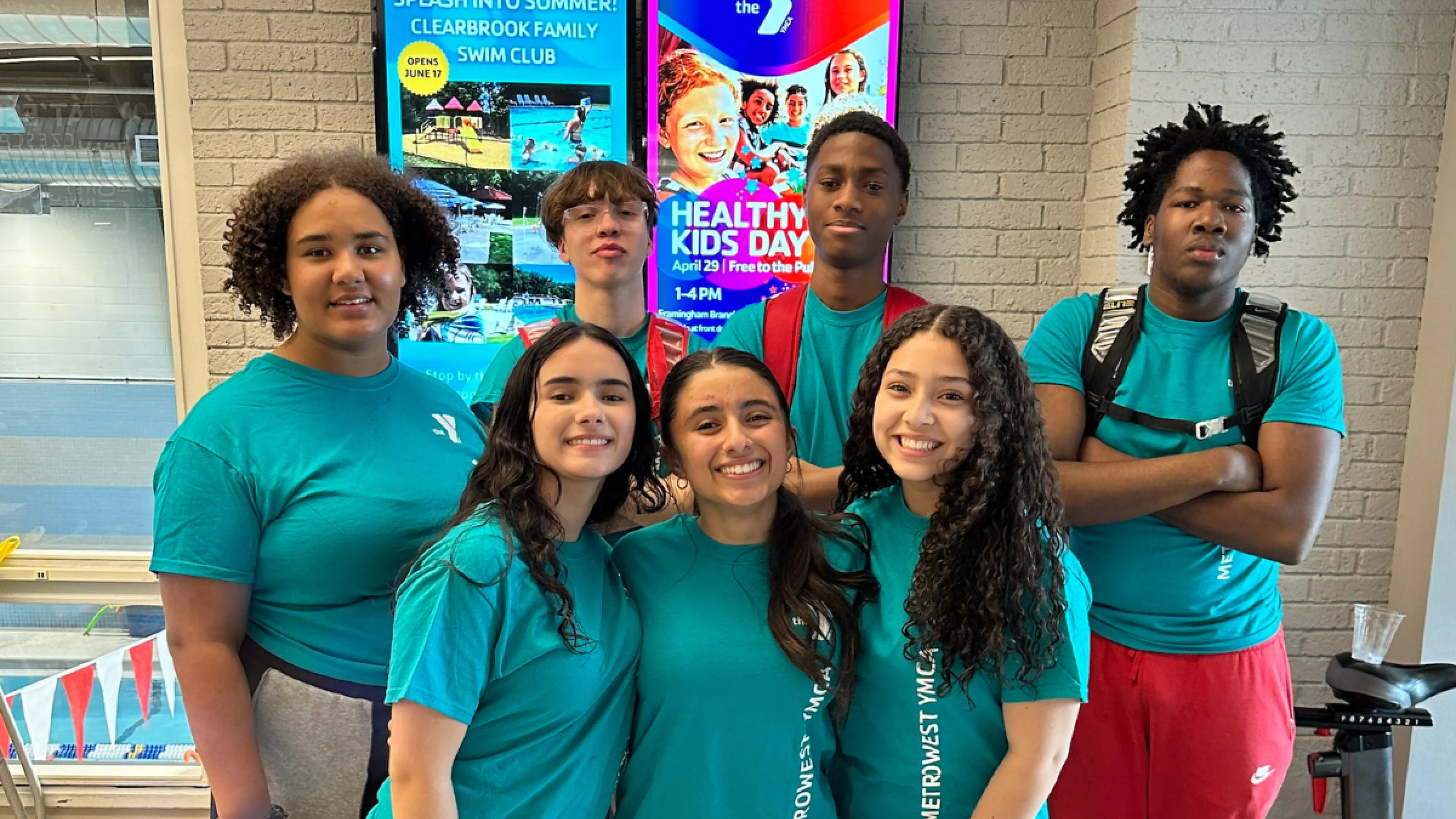 group of teenagers smiling for the camera