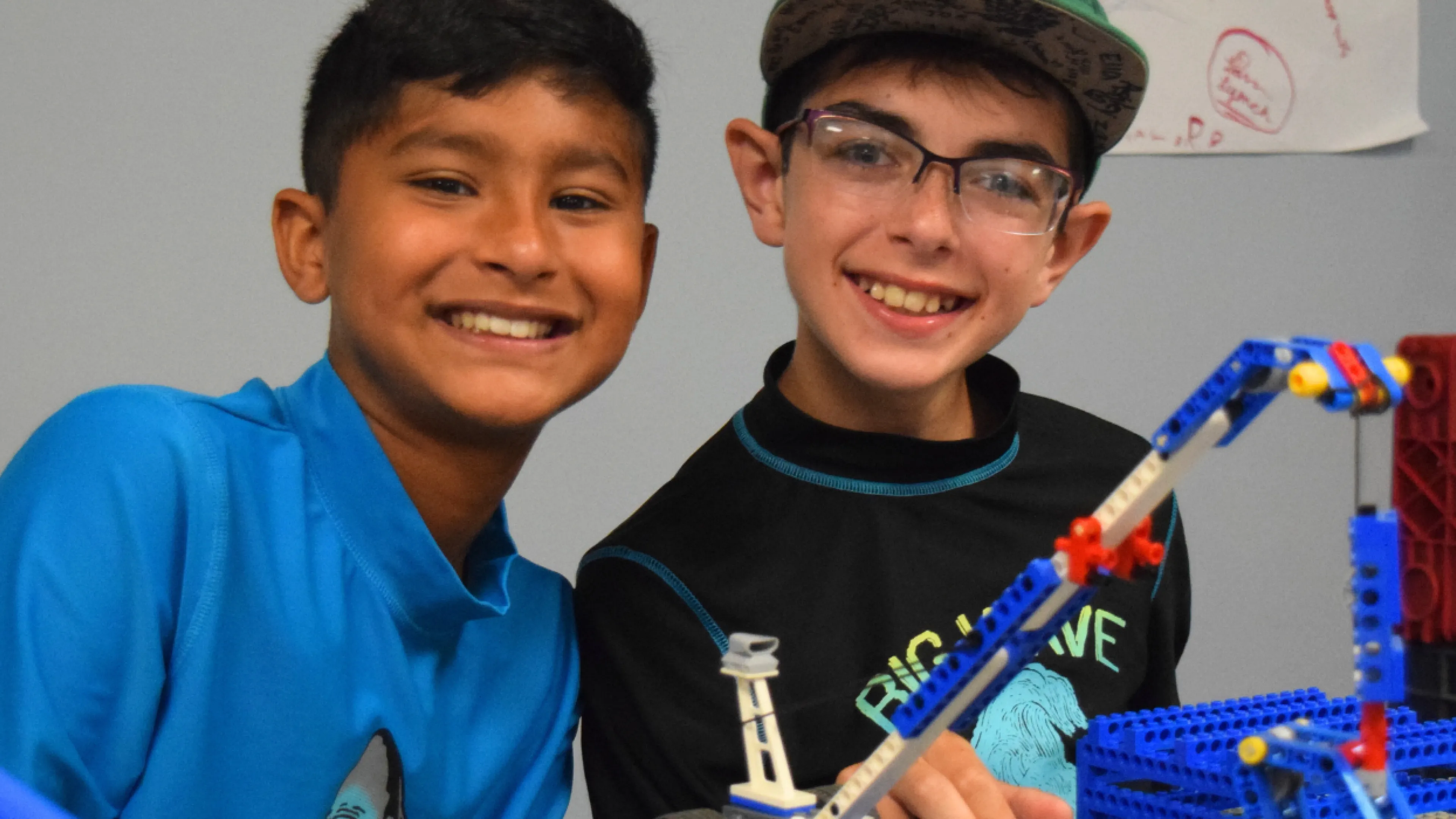 image of two boys playing with legos