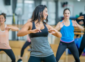 woman dancing in fitness class