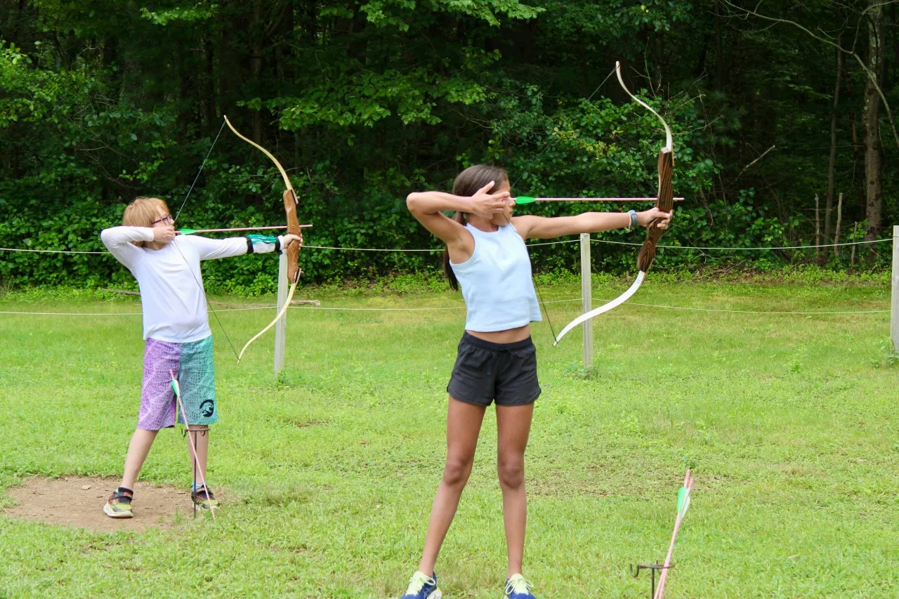 photo of kids doing archery