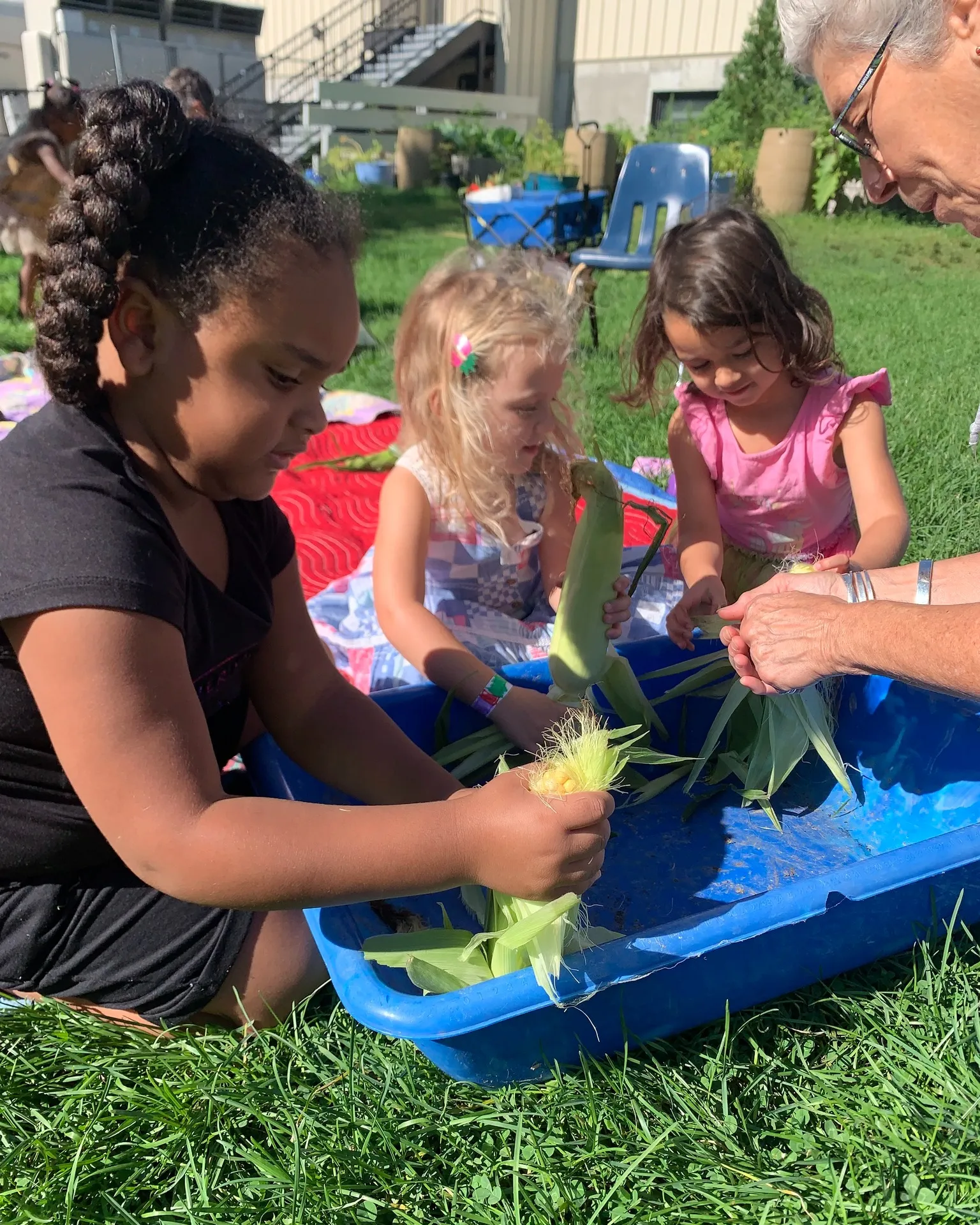 photo of little girls learning about vegetables