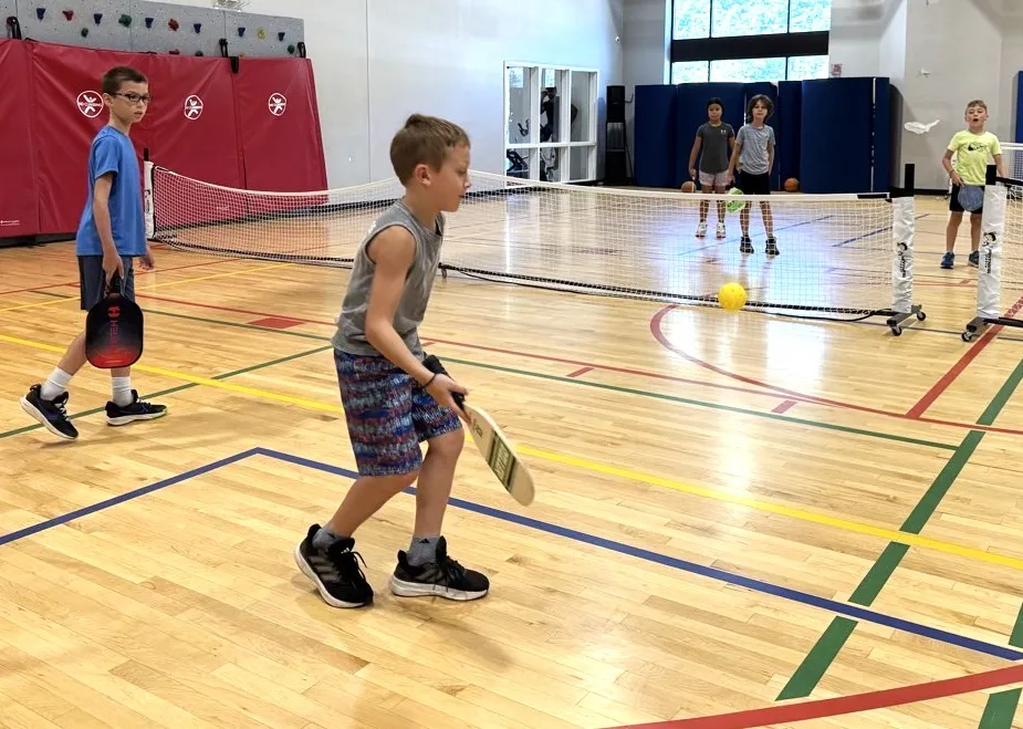 campers playing indoor pickleball