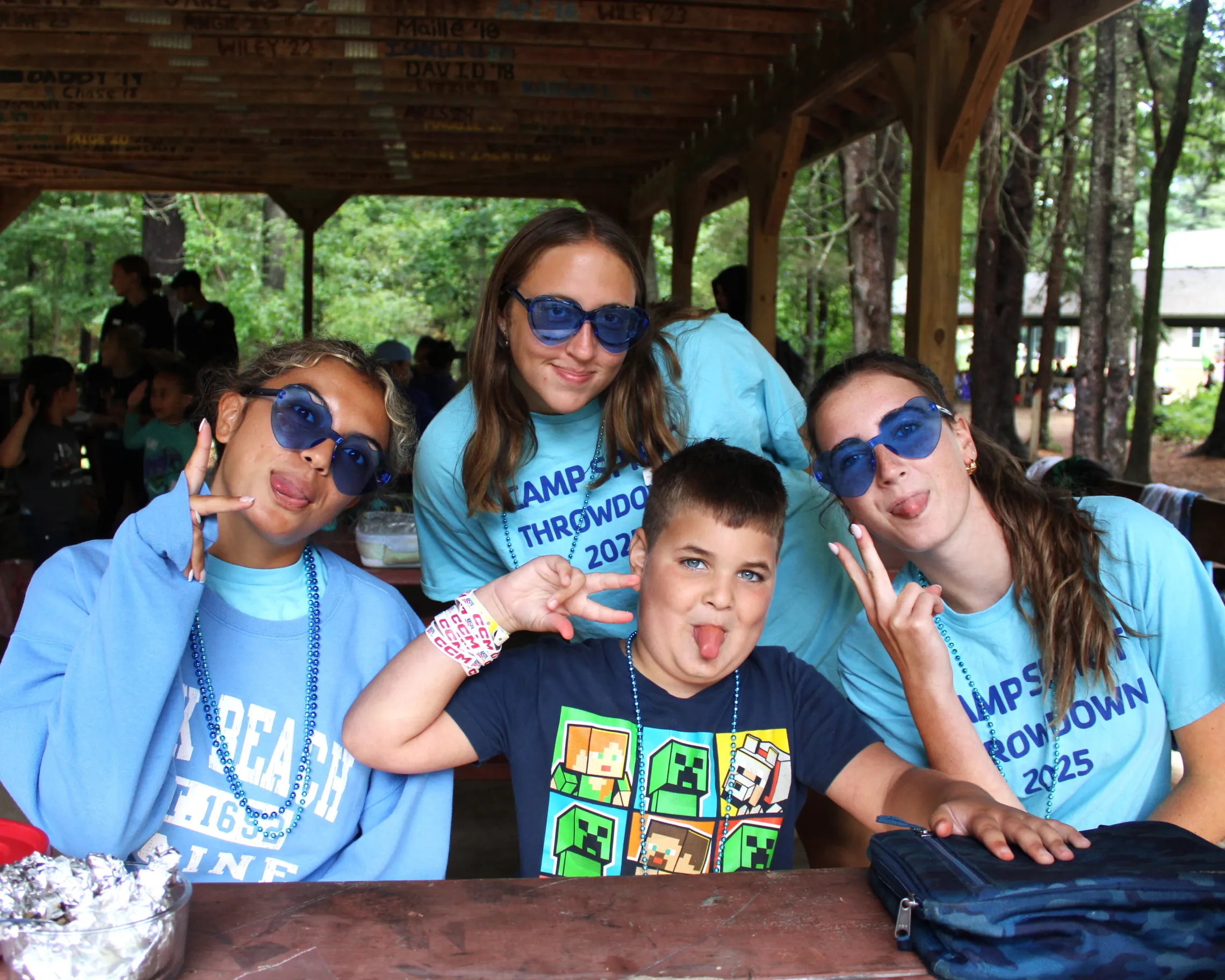 camper and counselors making silly faces
