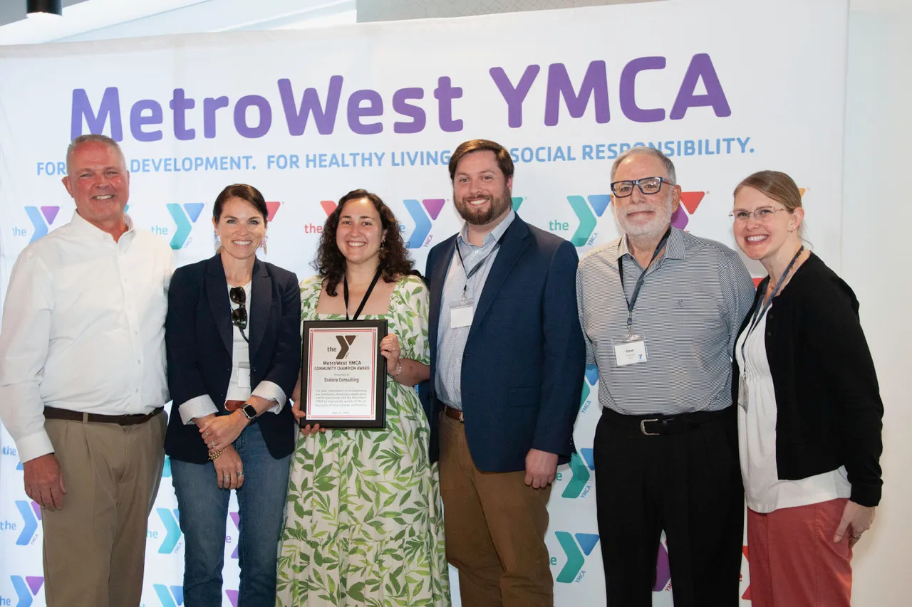 Scalora Consulting Team Accepts Award