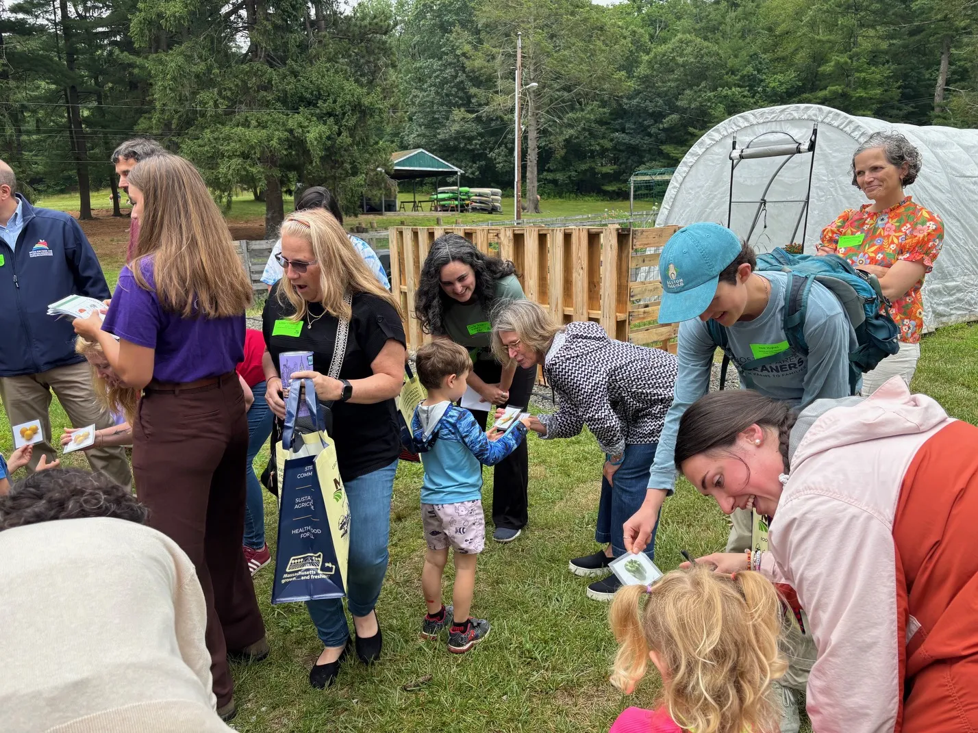 Secretary Kershaw interacts with children in the garden