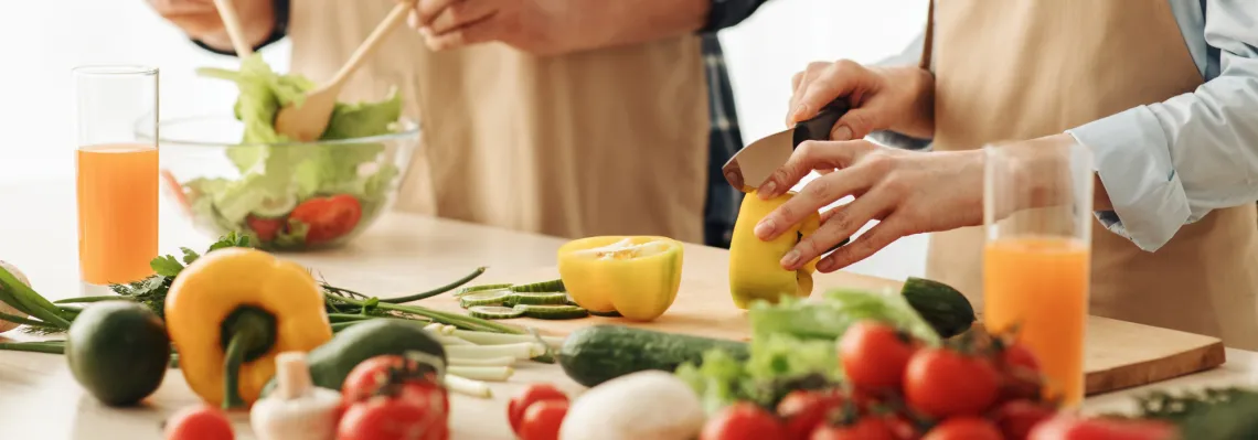 close up image of people making a nutritious meal