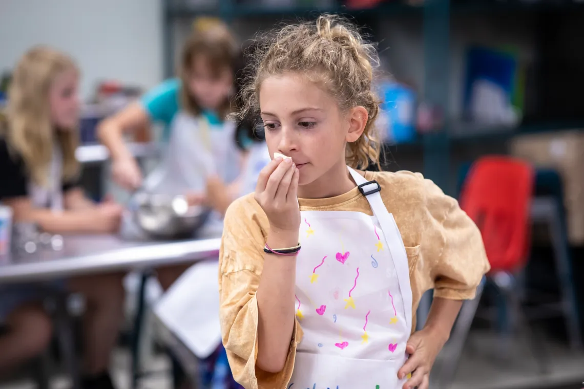 image of young girl in cooking class