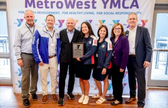 group photo with Community Partner Award Winner