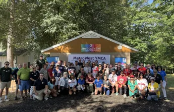 Local leaders meet at the MetroWest YMCA Summer Camp in Hopkinton to learn about the organization's youth-serving programs