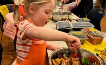 photo of young girl in cooking class