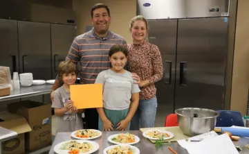 family of four during cooking class