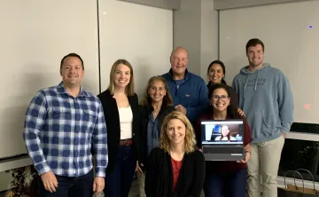 image of a group of people smiling for the camera